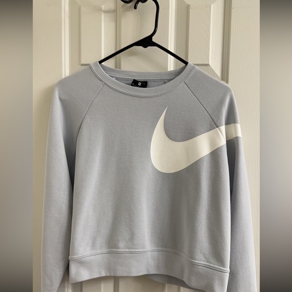 Nike baby blue cropped dri-fit crew neck.